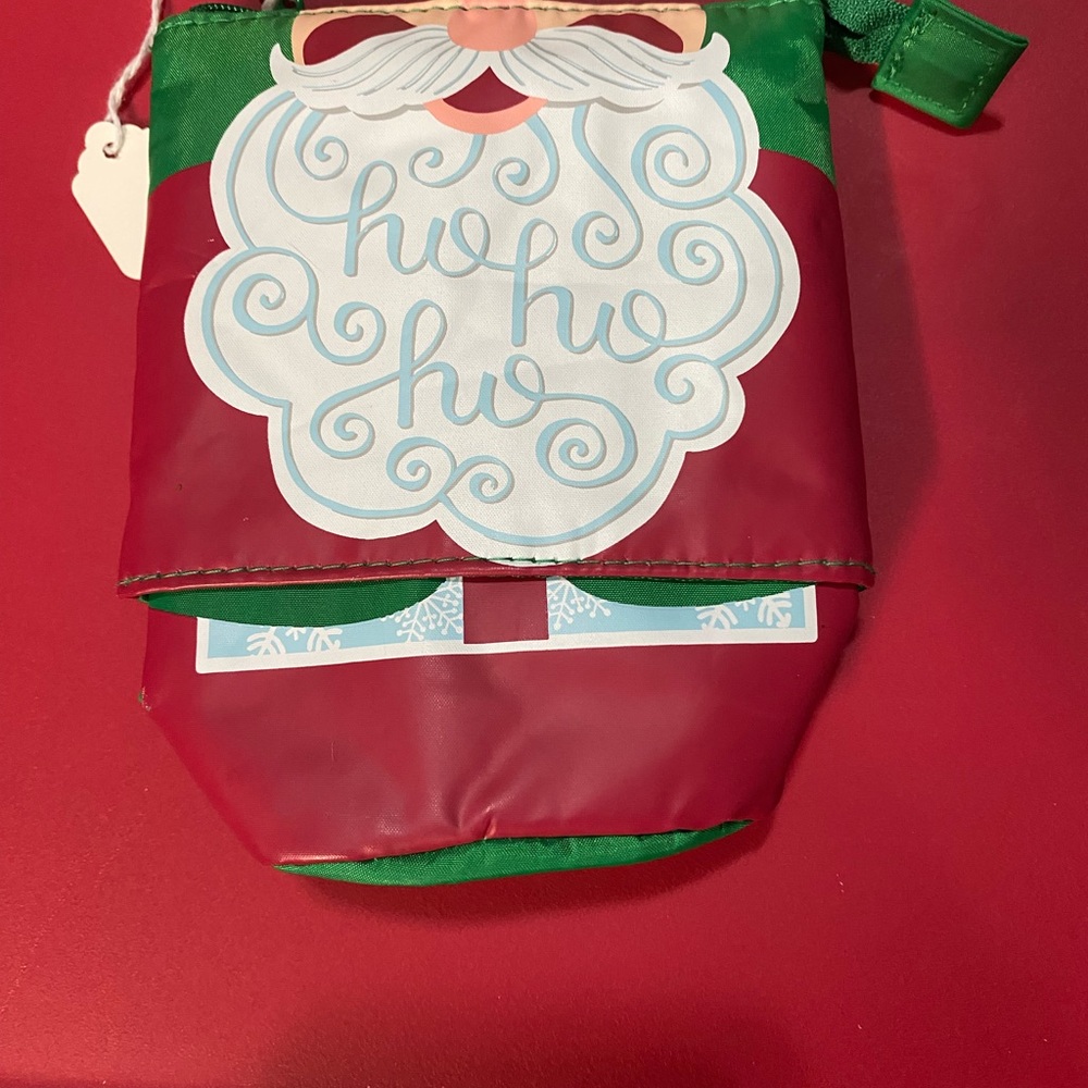 NWT HIDE AND PEEK POUCH